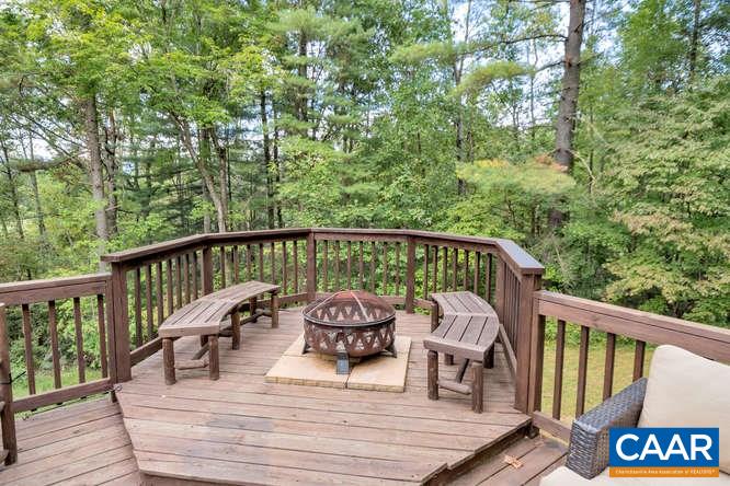 107 Goldenrod Road Ruckersville, VA 22968 - Photo 25 of 31 a view of a two chairs and table on the deck