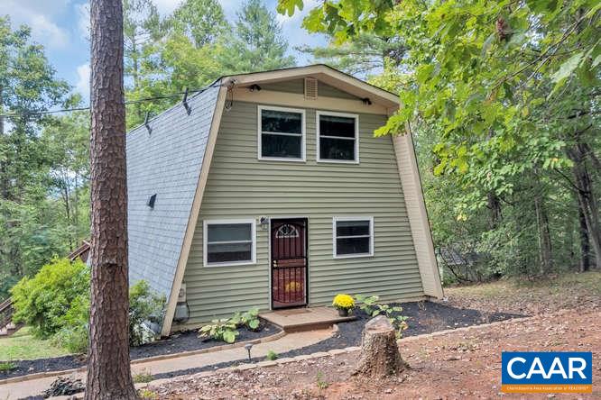 107 Goldenrod Road Ruckersville, VA 22968 - Photo 5 of 31 a front view of a house with a yard