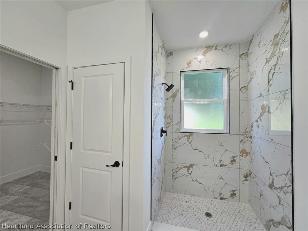 7324 Rolling Hills Road Sebring, FL 33876 - Photo 18 of 23 a bathroom with a shower