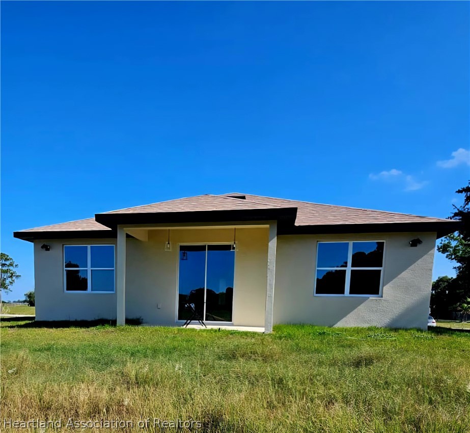 7324 Rolling Hills Road Sebring, FL 33876 - Photo 5 of 23 a house view with a outdoor space