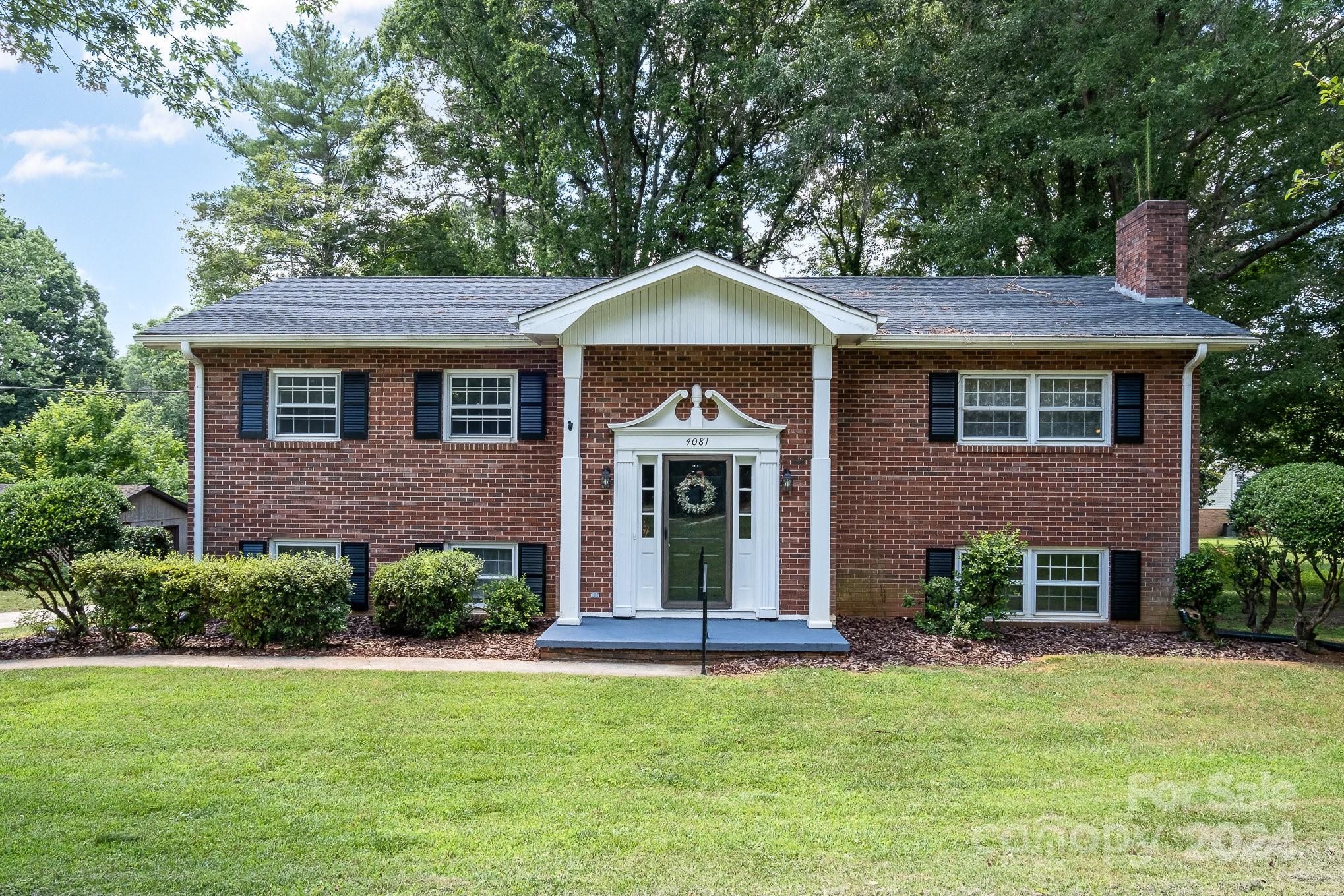 4081 Section House Road Hickory, NC 28601 - Photo 1 of 38 a front view of a house with a yard