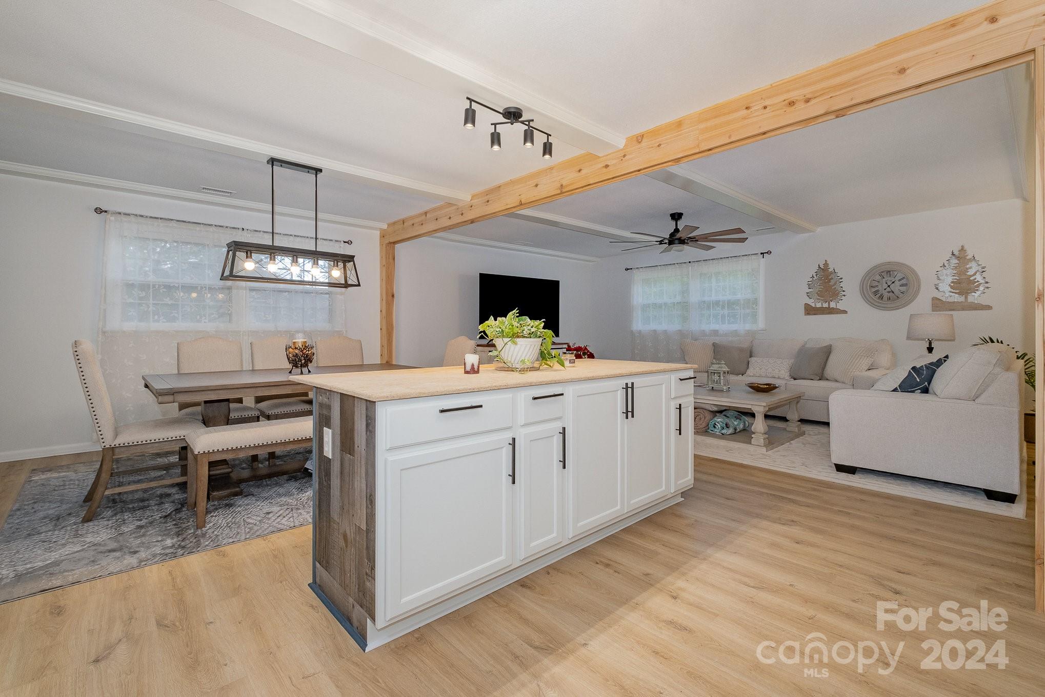 4081 Section House Road Hickory, NC 28601 - Photo 13 of 38 a kitchen that has a lot of cabinets in it and wooden floor