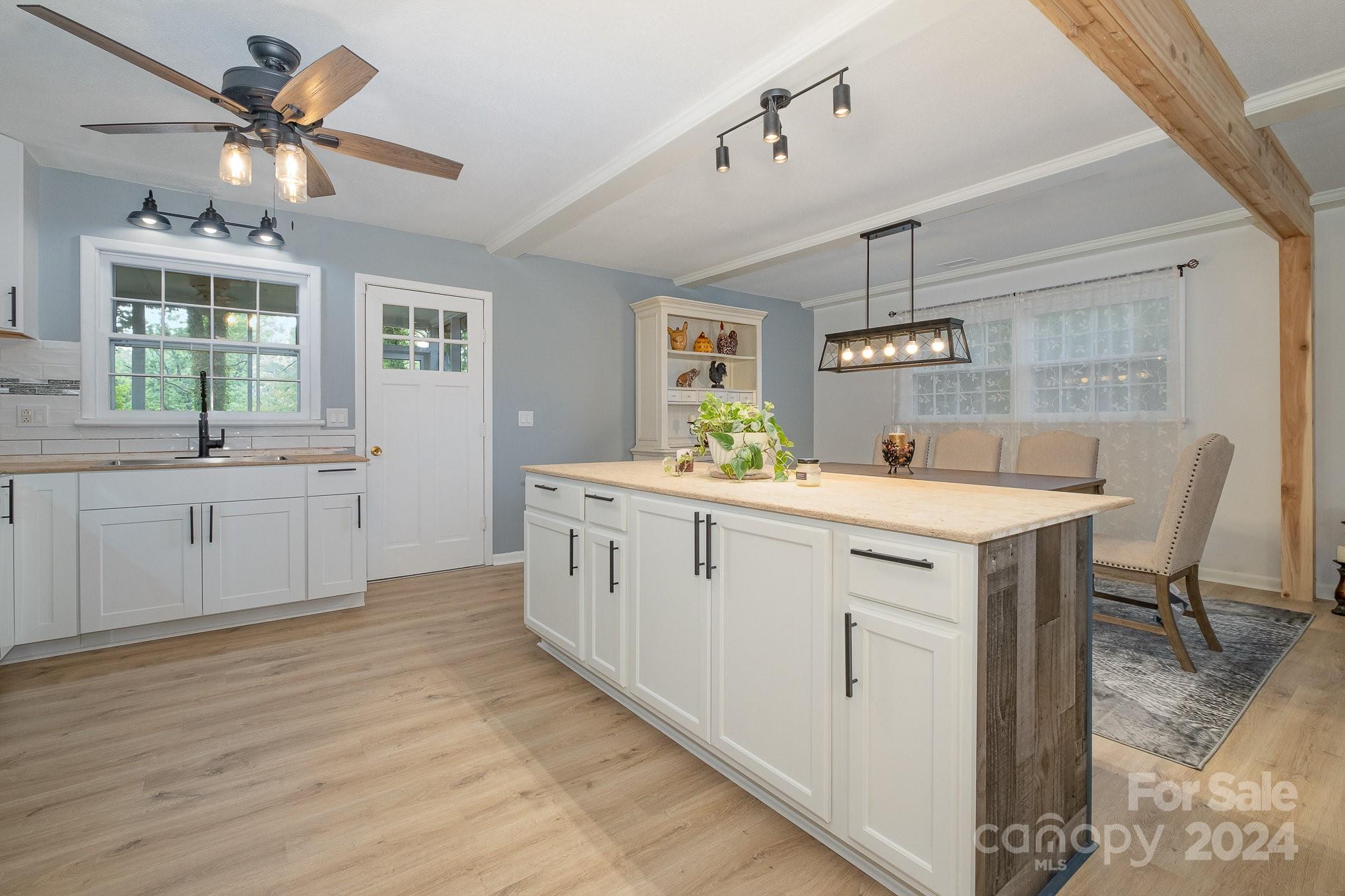 4081 Section House Road Hickory, NC 28601 - Photo 14 of 38 a kitchen with a sink cabinets and window