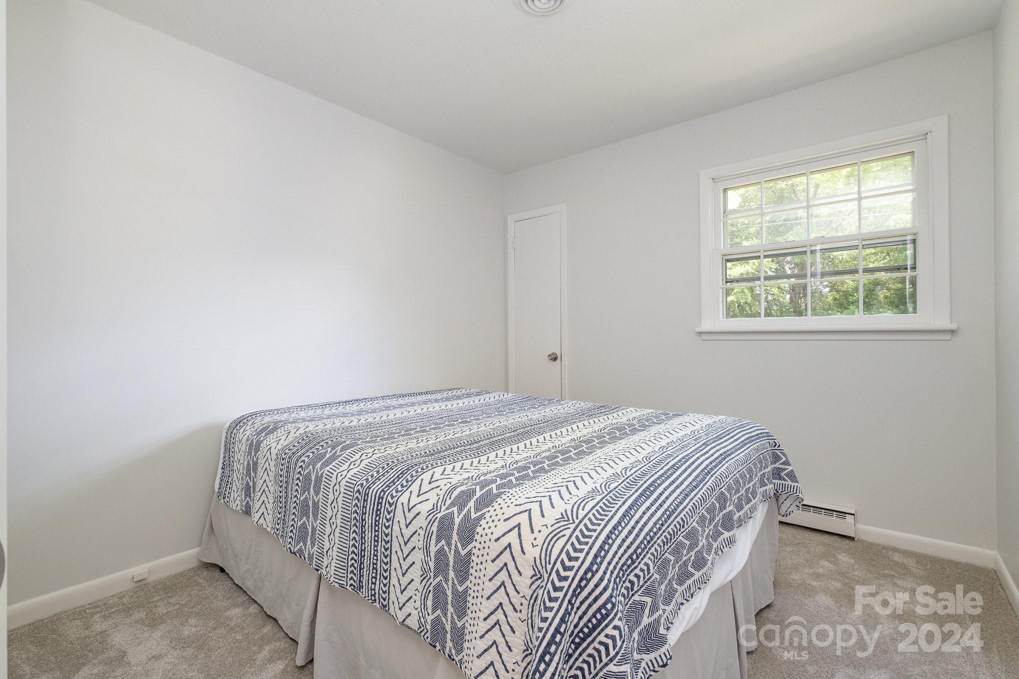 4081 Section House Road Hickory, NC 28601 - Photo 18 of 38 a bedroom with a bed and a window