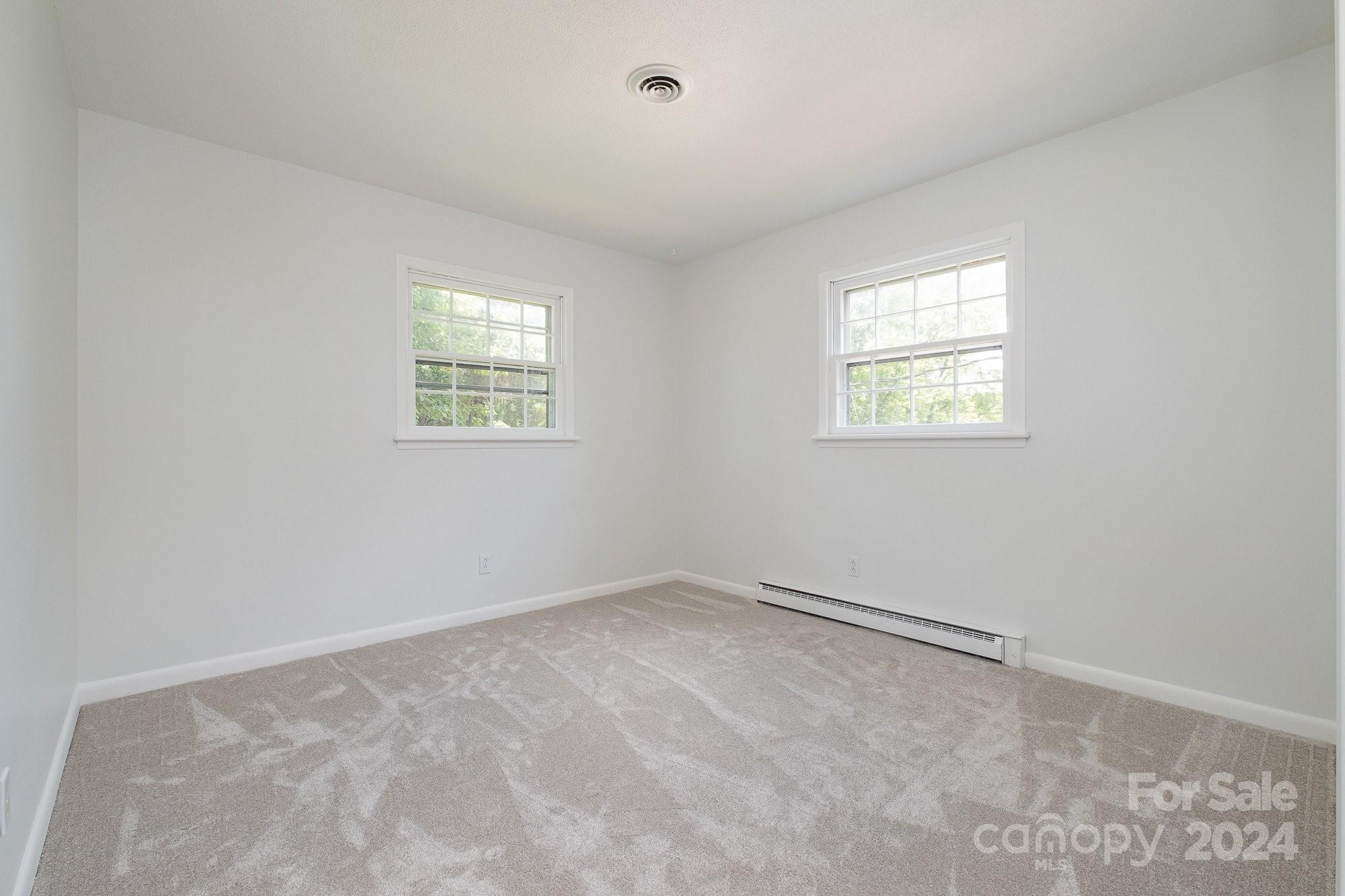 4081 Section House Road Hickory, NC 28601 - Photo 19 of 38 an empty room with windows