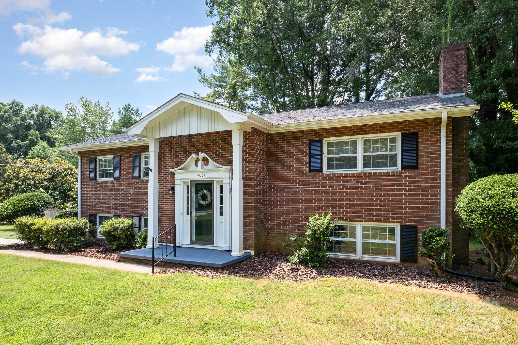 4081 Section House Road Hickory, NC 28601 - Photo 2 of 38 a front view of a house with garden