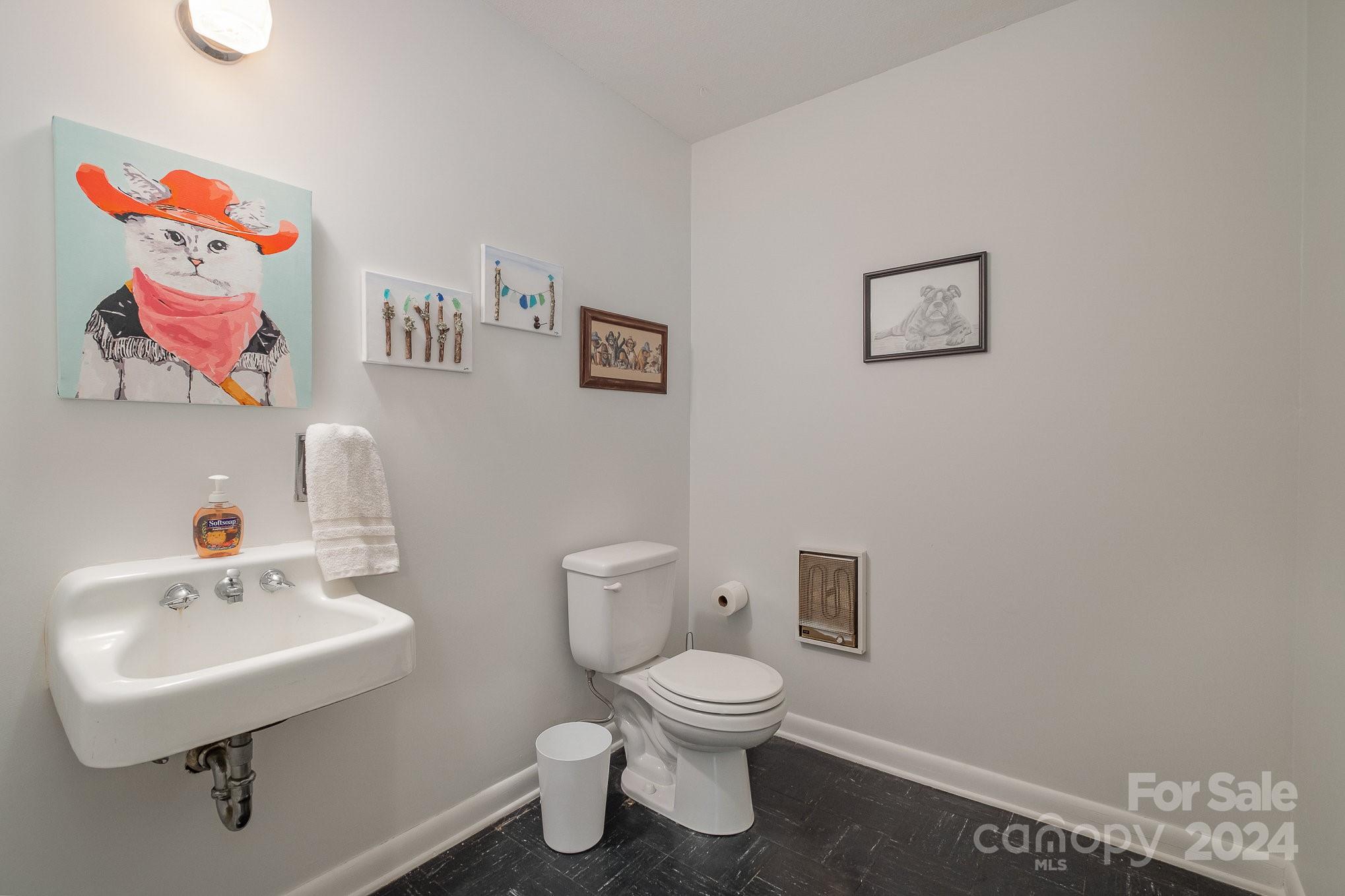 4081 Section House Road Hickory, NC 28601 - Photo 28 of 38 a bathroom with a toilet sink and mirror