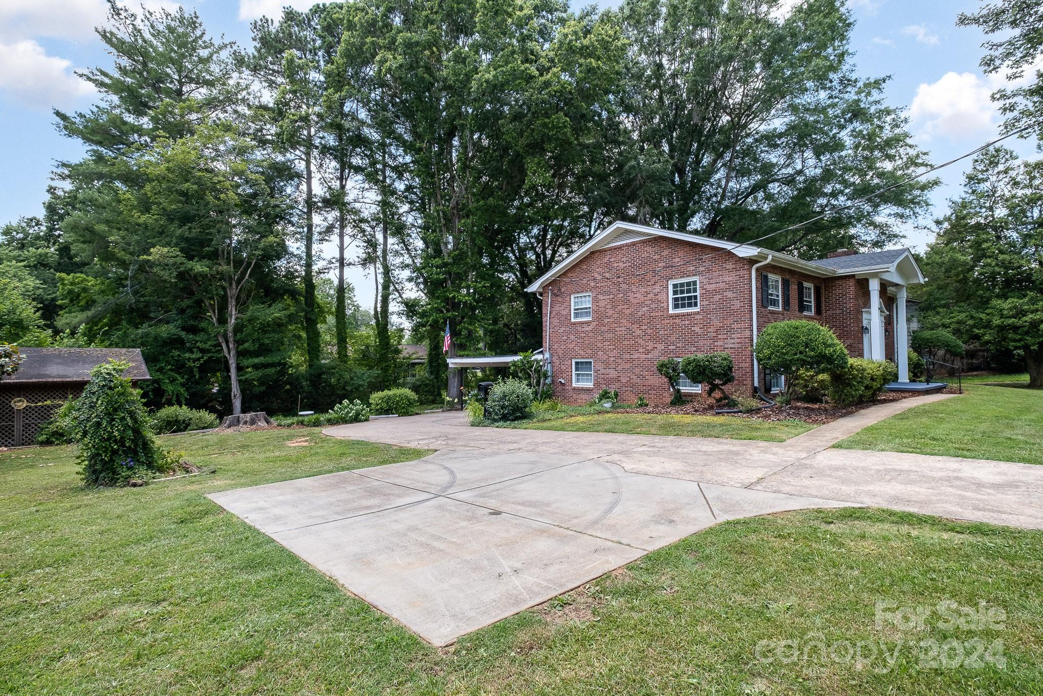 4081 Section House Road Hickory, NC 28601 - Photo 3 of 38 a front view of a house with a yard