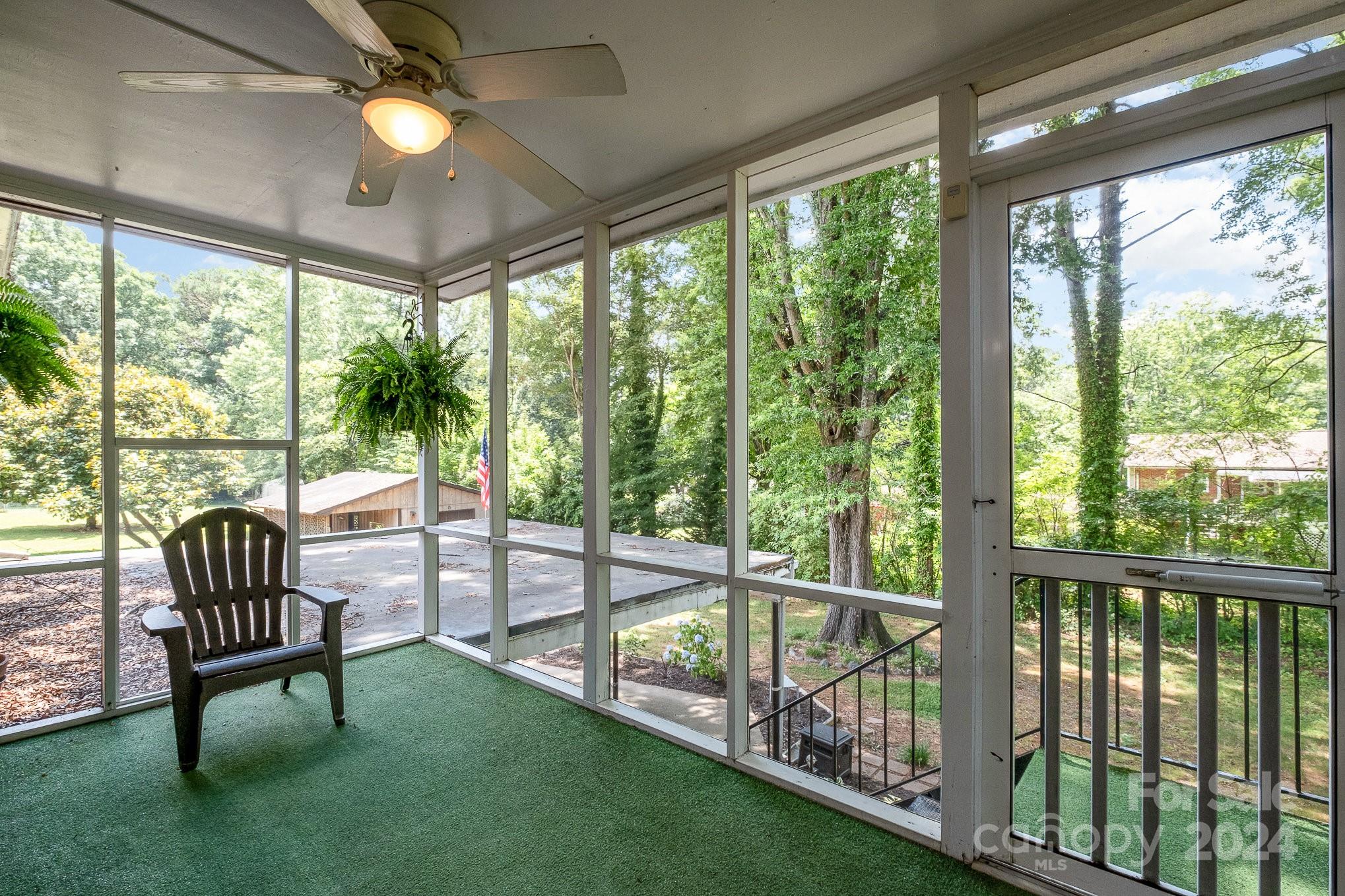 4081 Section House Road Hickory, NC 28601 - Photo 31 of 38 a view of a porch with chairs and backyard
