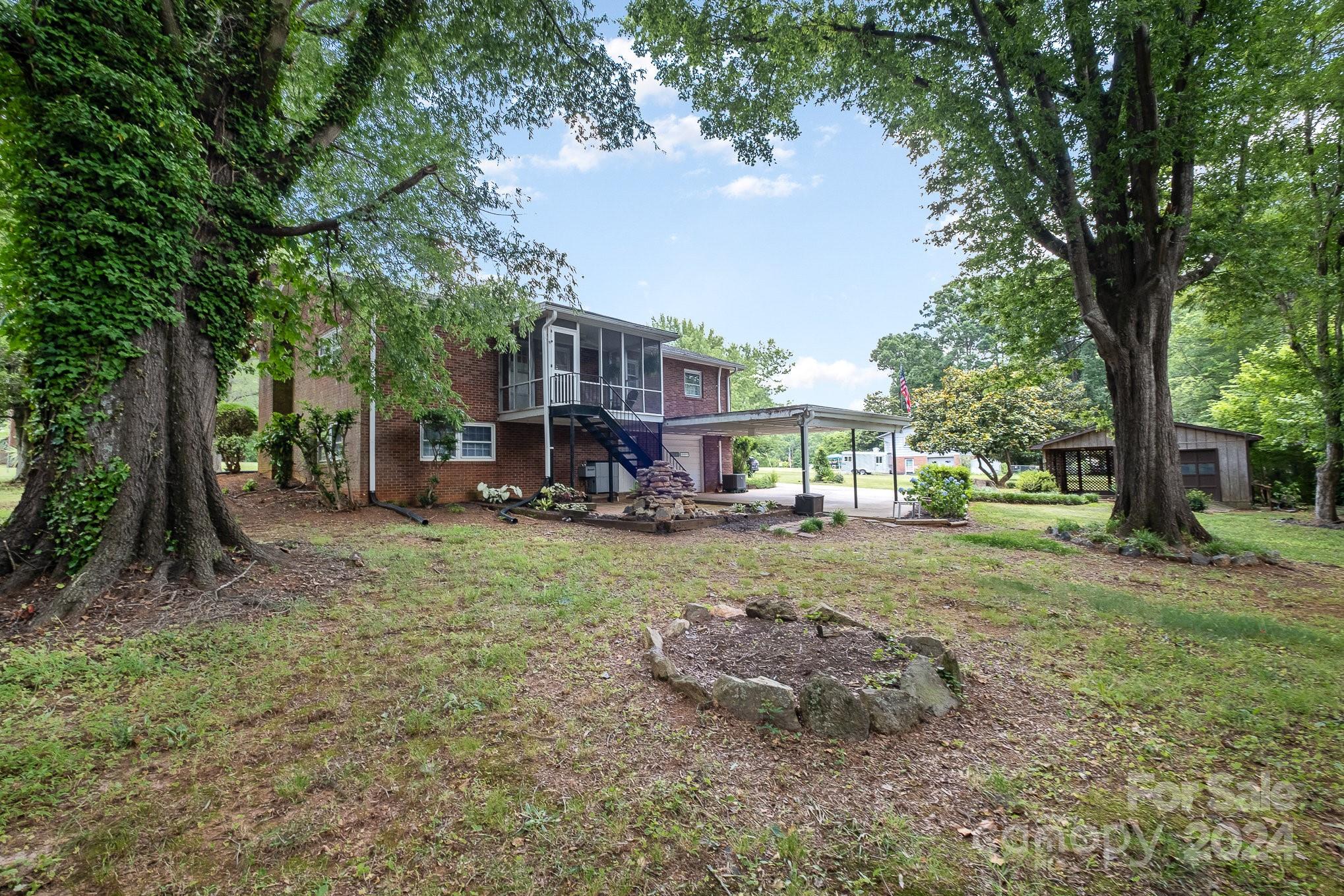 4081 Section House Road Hickory, NC 28601 - Photo 35 of 38 a view of a house with a yard