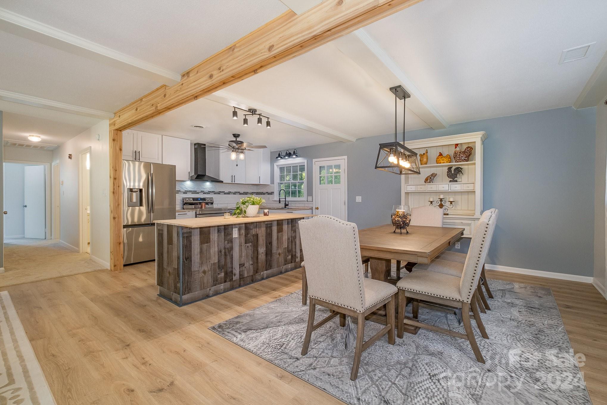 4081 Section House Road Hickory, NC 28601 - Photo 8 of 38 a view of a dining room with furniture