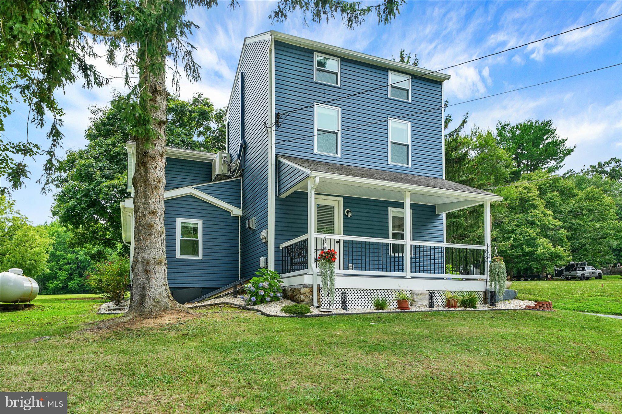 1847 Blue Ball Road Elkton, MD 21921 - Photo 3 of 45 Charming blue home with lush surroundings.