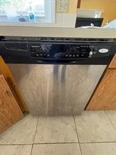 a living room with furniture gym equipment and a rug