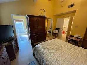 a view of a room that has a large window