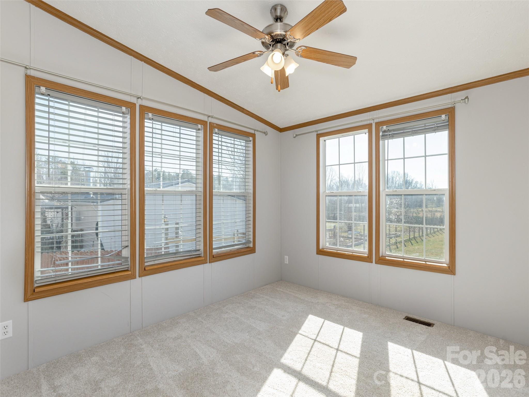 112 Lynn Estate Road Hendersonville, NC 28792 - Photo 15 of 24 a view of an empty room with a window