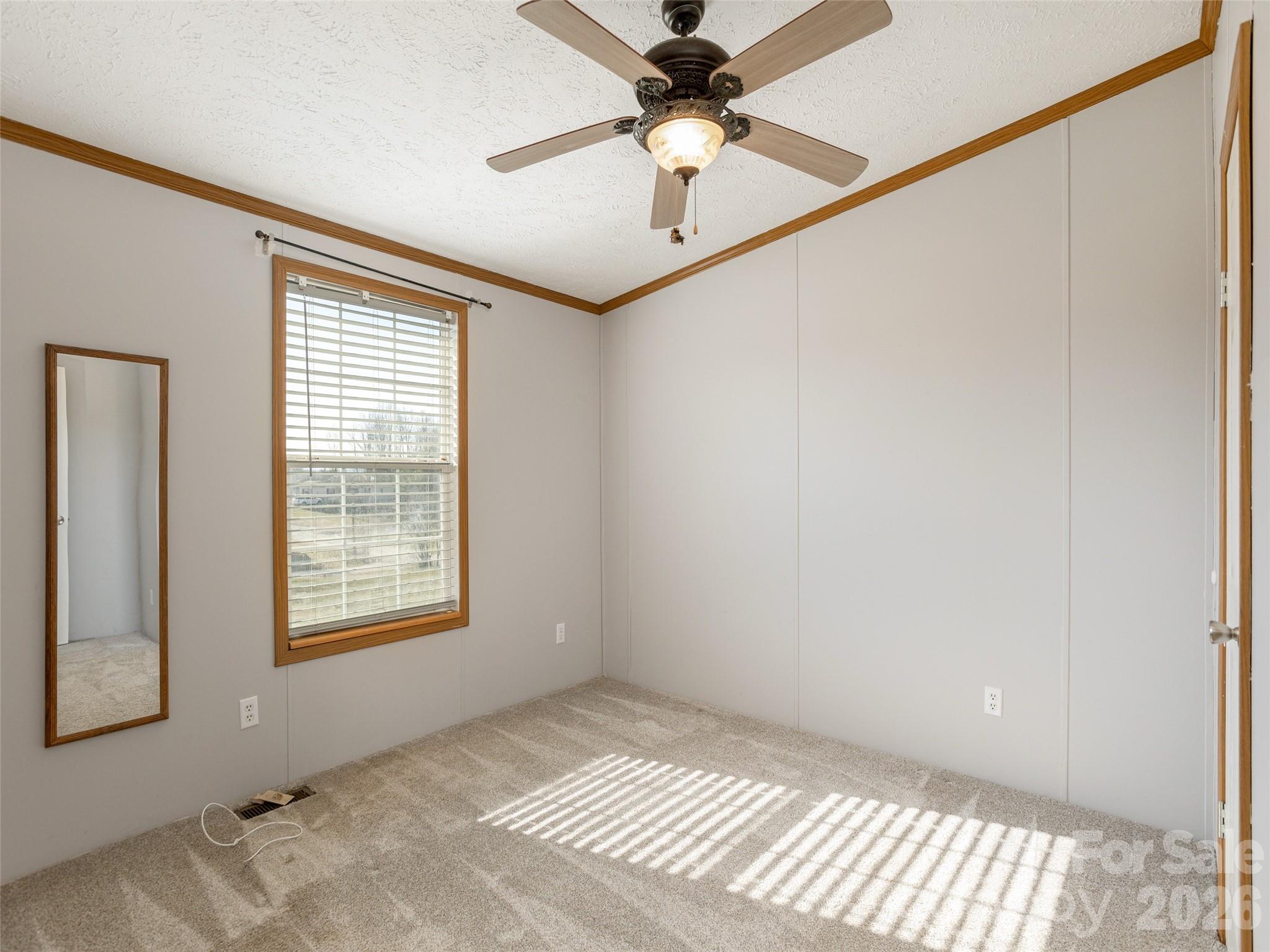 112 Lynn Estate Road Hendersonville, NC 28792 - Photo 19 of 24 a view of an empty room and window