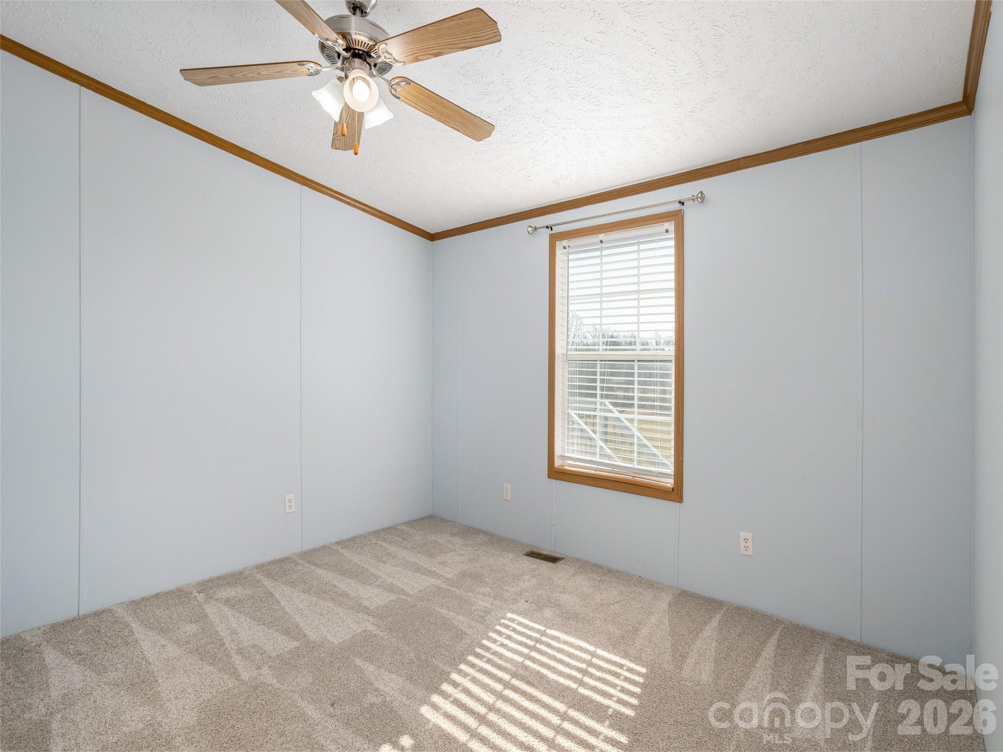 112 Lynn Estate Road Hendersonville, NC 28792 - Photo 21 of 24 a view of an empty room with a window
