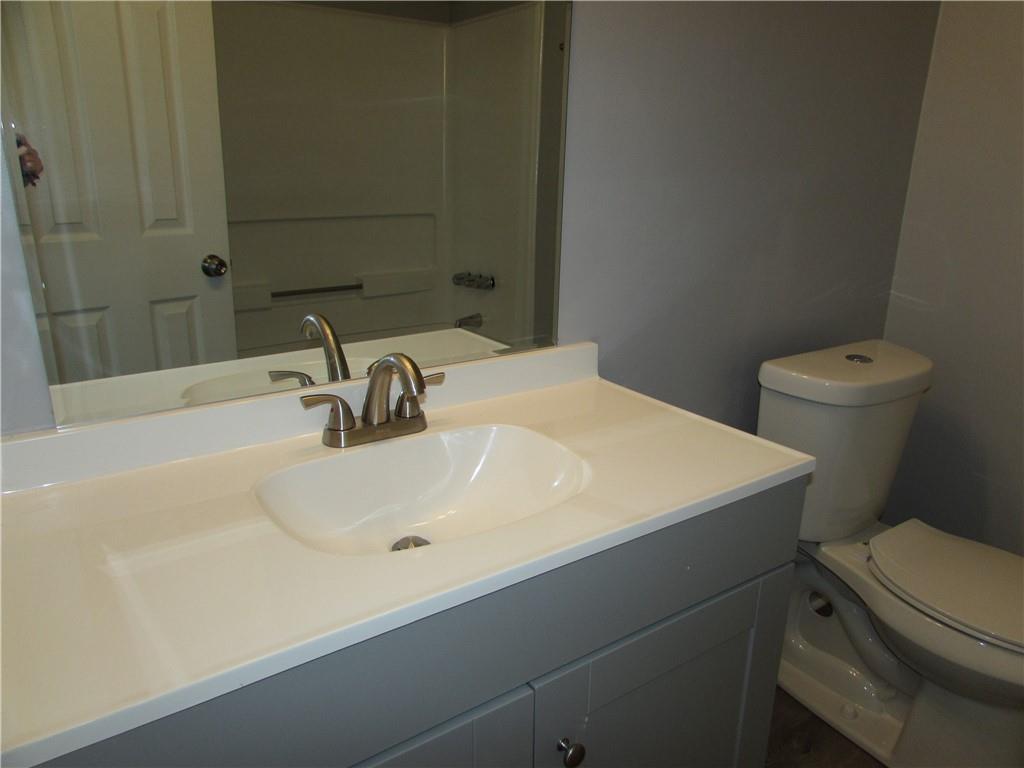 835 Heritage Valley Road Norcross, GA 30093 - Photo 25 of 34 a bathroom with a sink and a toilet