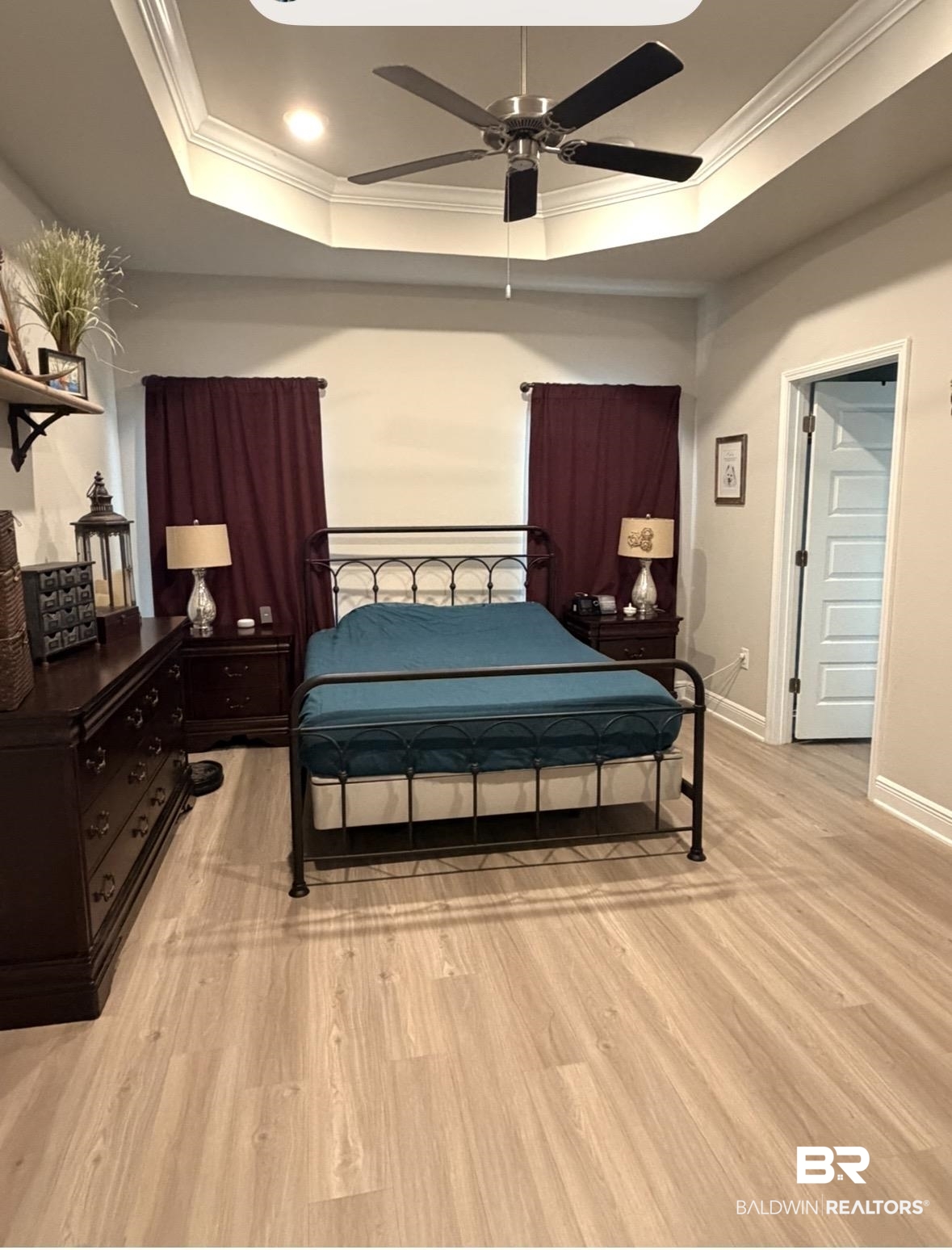 32215 Calder Court Daphne, AL 36527 - Photo 7 of 13 Bedroom featuring crown molding, light wood-type flooring, ceiling fan, a raised ceiling, and recessed lighting