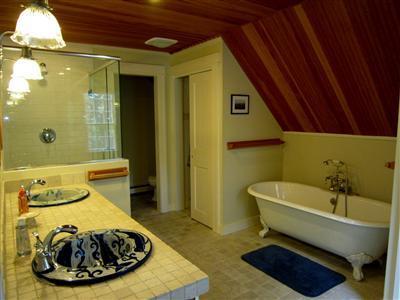 19 Higgins Hollow Road Truro, MA 02666 - Photo 20 of 34 a bathroom with a sink and a bathtub