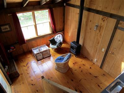 19 Higgins Hollow Road Truro, MA 02666 - Photo 28 of 34 a living room with furniture and a window