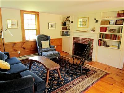 19 Higgins Hollow Road Truro, MA 02666 - Photo 8 of 34 a bedroom with furniture and a fireplace