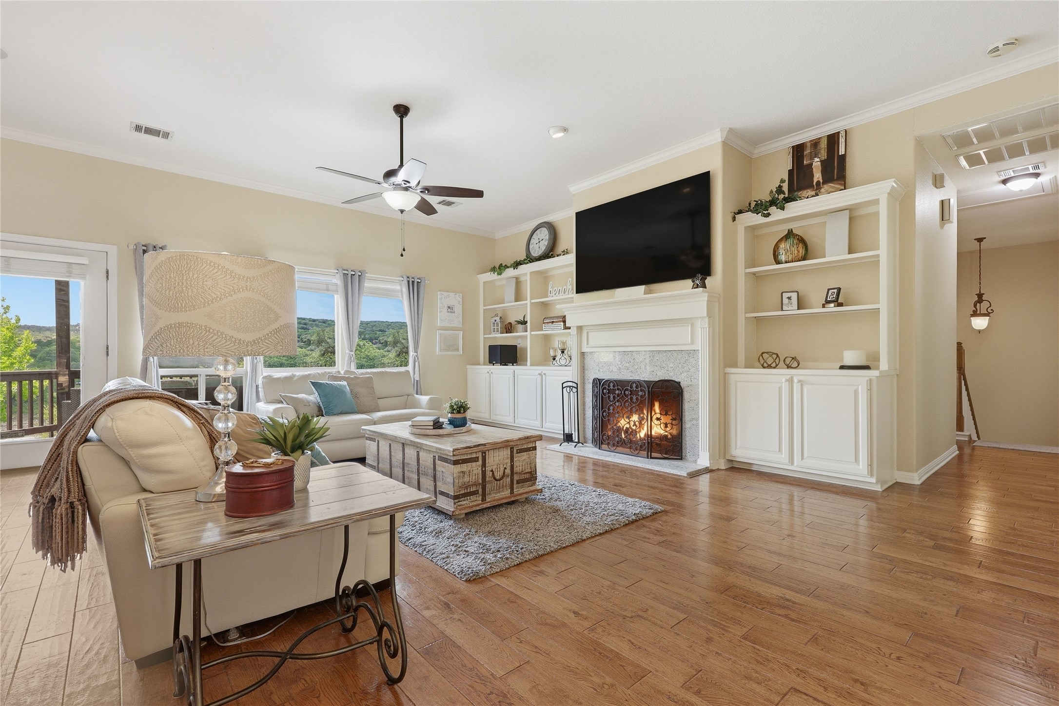 10802 Beach Road Leander, TX 78641 - Photo 11 of 40 Wood burning fireplace and beautiful built-ins.