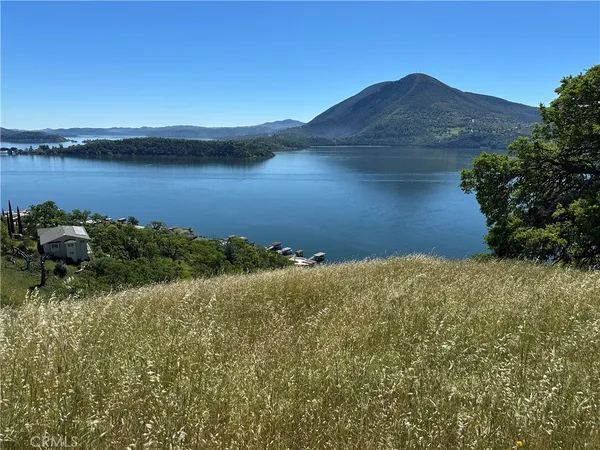a view of a lake with a mountain in the background
