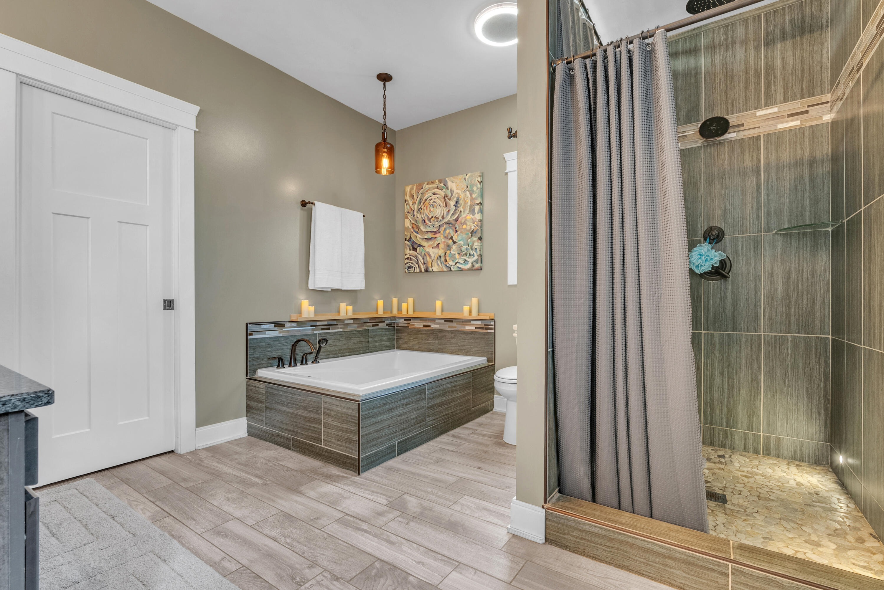 10427 North 600th Street West Demotte, IN 46310 - Photo 17 of 26 a spacious bathroom with a tub sink and shower