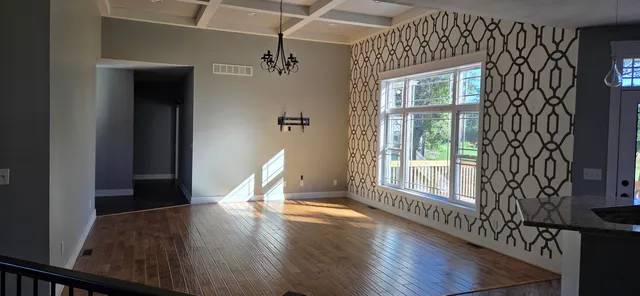 a view of a kitchen from the hallway