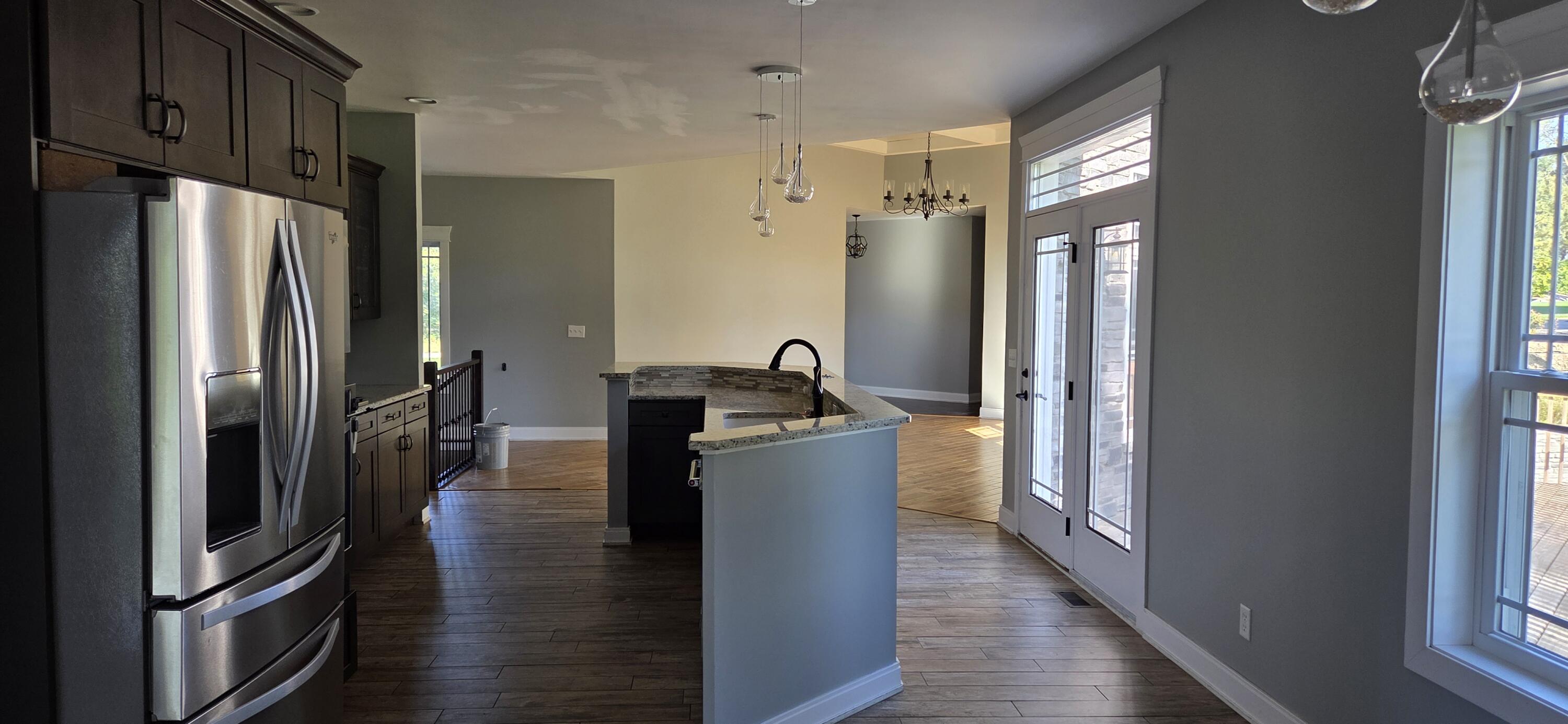 10427 North 600th Street West Demotte, IN 46310 - Photo 6 of 26 a kitchen with stainless steel appliances granite countertop a refrigerator and a sink