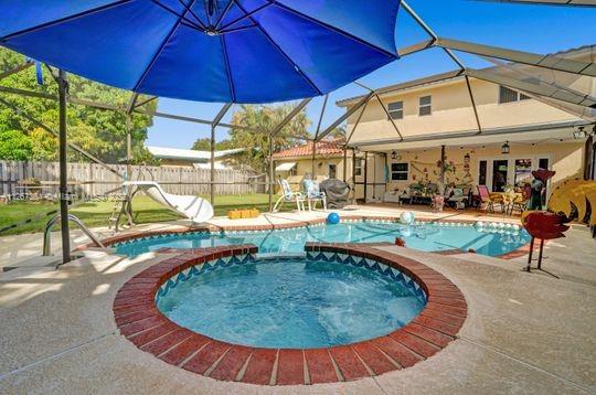 5440 Buchanan Street Hollywood, FL 33021 - Photo 19 of 34 an outdoor space with seating