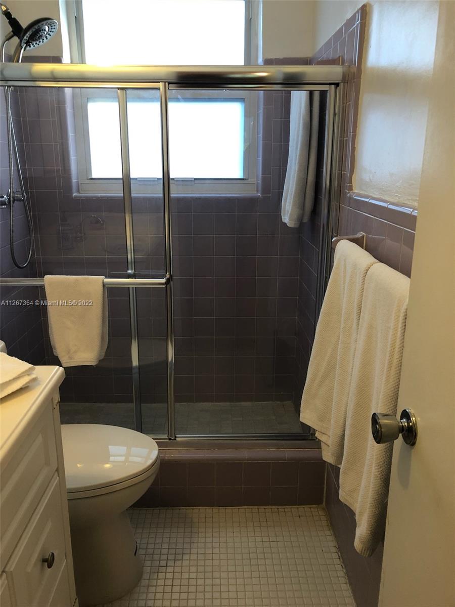 5440 Buchanan Street Hollywood, FL 33021 - Photo 29 of 34 a bathroom with a toilet and a shower