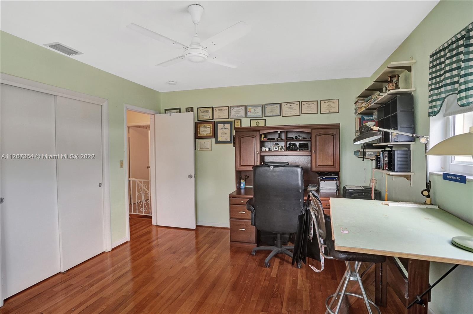 5440 Buchanan Street Hollywood, FL 33021 - Photo 31 of 34 a view of a dining room with furniture window and wooden floor