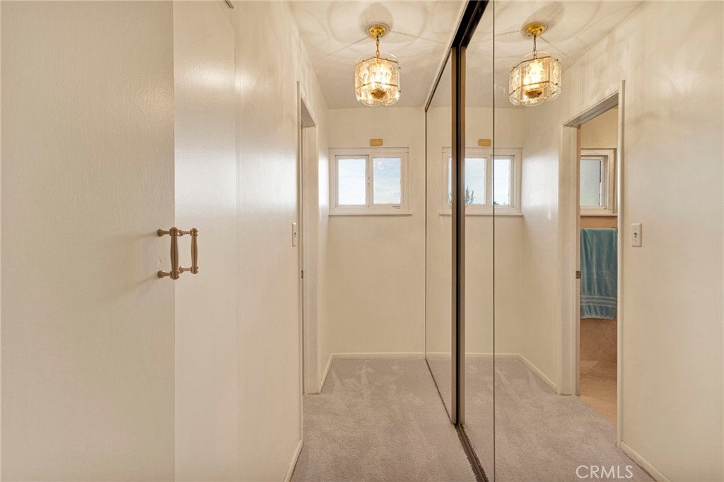 15177 Mendota Road North Apple Valley, CA 92307 - Photo 16 of 50 a view of a hallway with wooden floor