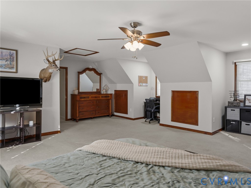 206 Rustic Drive Carson, VA 23830 - Photo 42 of 51 a living room with furniture and a flat screen tv