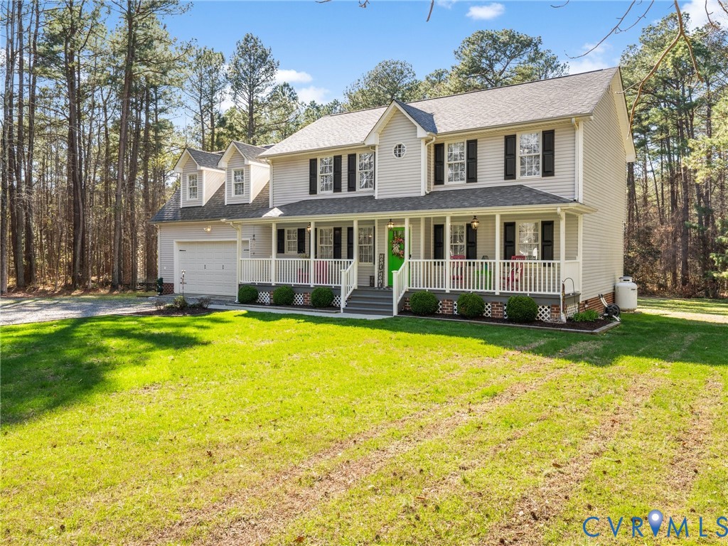 206 Rustic Drive Carson, VA 23830 - Photo 49 of 51 a front view of a house with swimming pool and porch