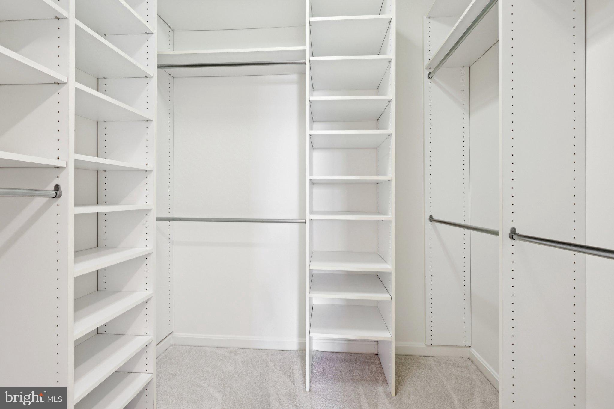 19375 Cypress Ridge Terrace, Unit 1111 Leesburg, VA 20176 - Photo 16 of 35 a view of an empty walk in closet