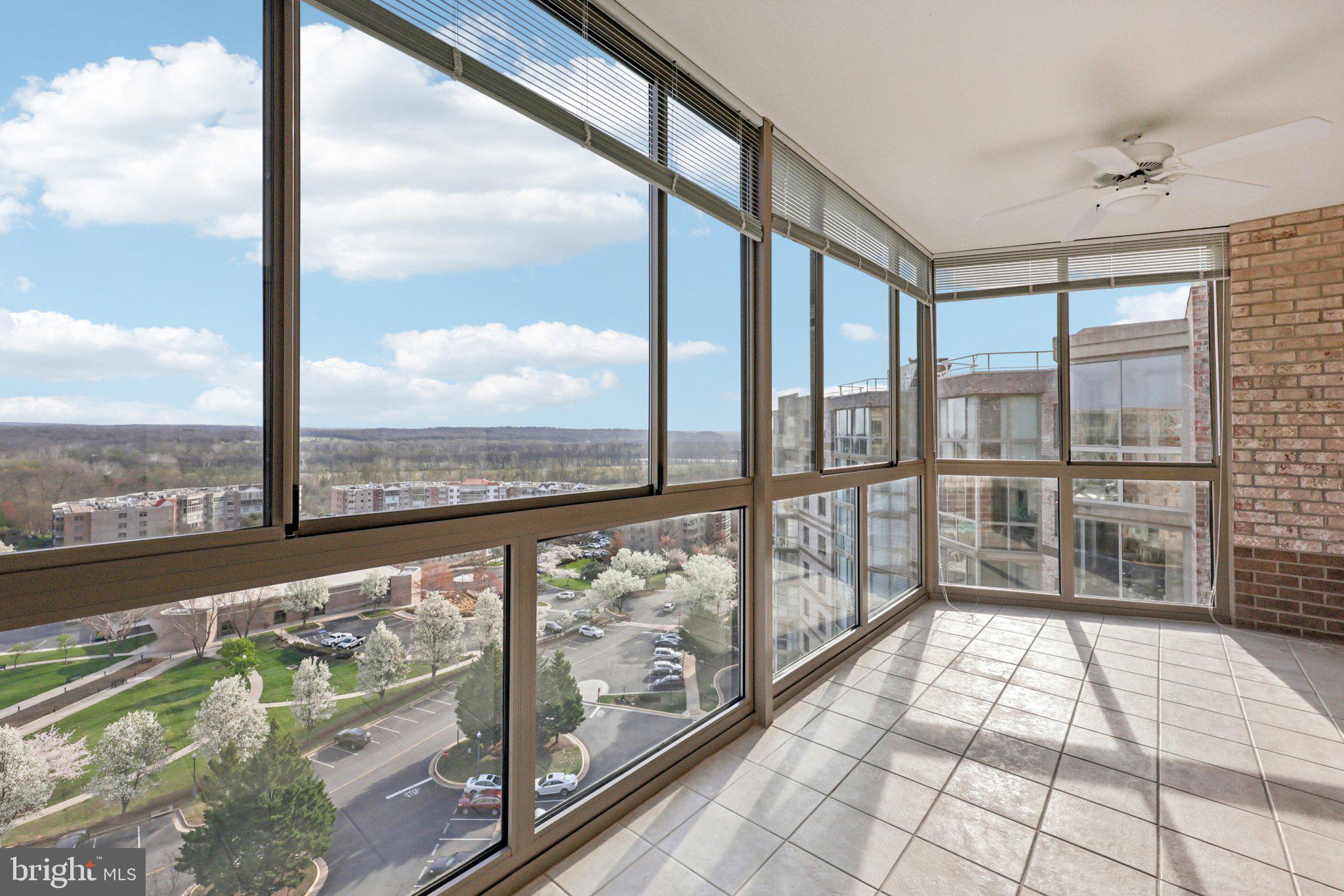 19375 Cypress Ridge Terrace, Unit 1111 Leesburg, VA 20176 - Photo 27 of 35 a view of a city from a balcony