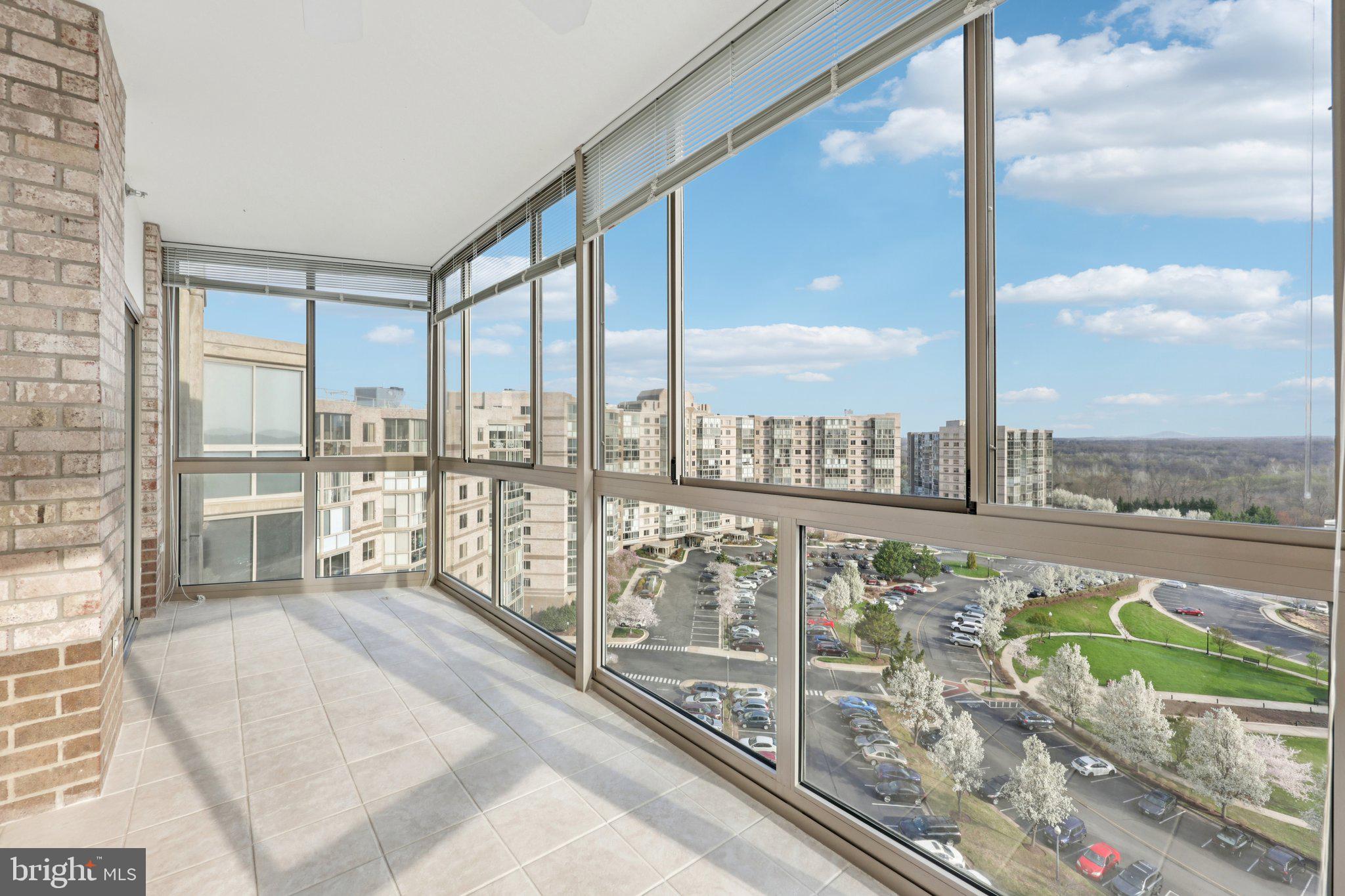 19375 Cypress Ridge Terrace, Unit 1111 Leesburg, VA 20176 - Photo 30 of 35 a view of a balcony with furniture