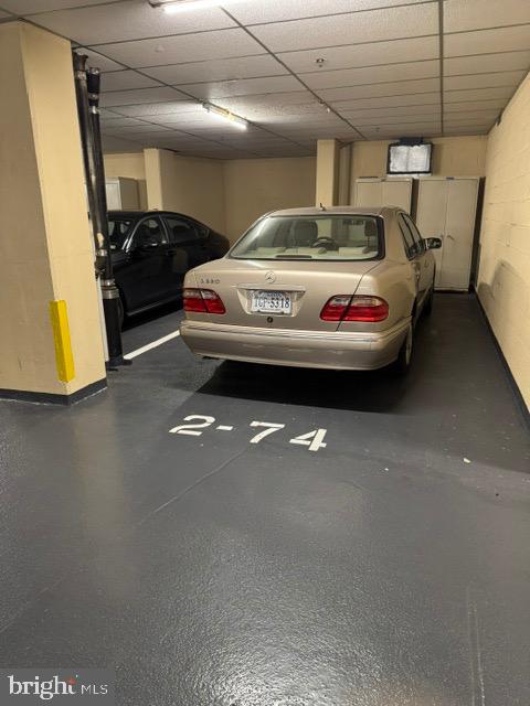 19375 Cypress Ridge Terrace, Unit 1111 Leesburg, VA 20176 - Photo 34 of 35 a view of parking garage with cars parked