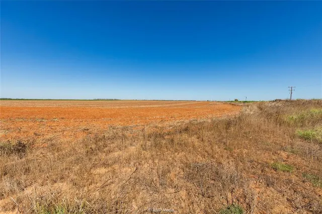 a view of beach and an ocean