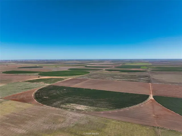 a view of a lake with a yard