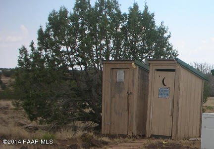 4892 North Ten Tanks Road Williams, AZ 86046 - Photo 4 of 14 Outhouse