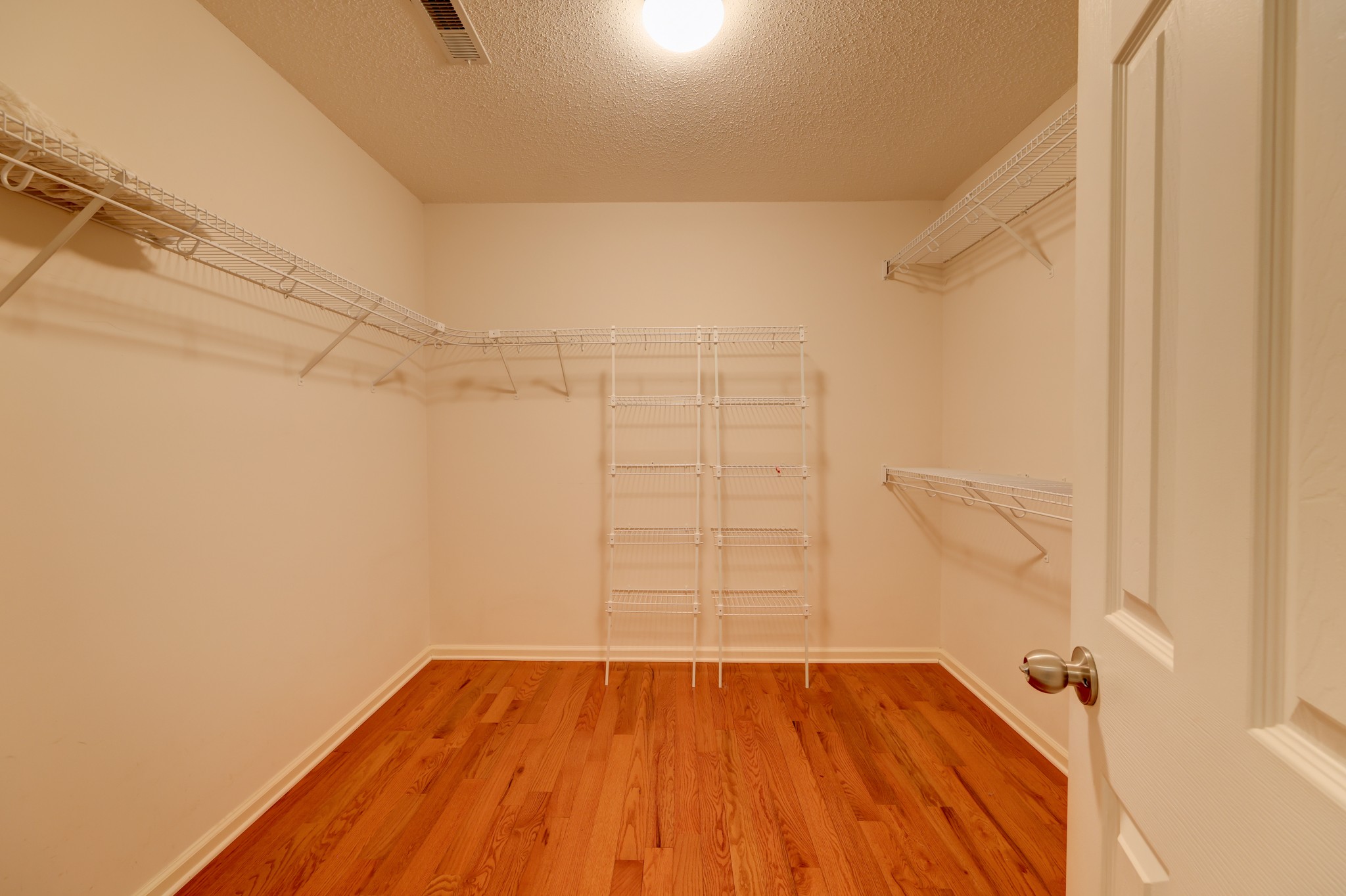 4445 Taylor Hall Lane Adams, TN 37010 - Photo 35 of 65 a view of a room with racks on the wall