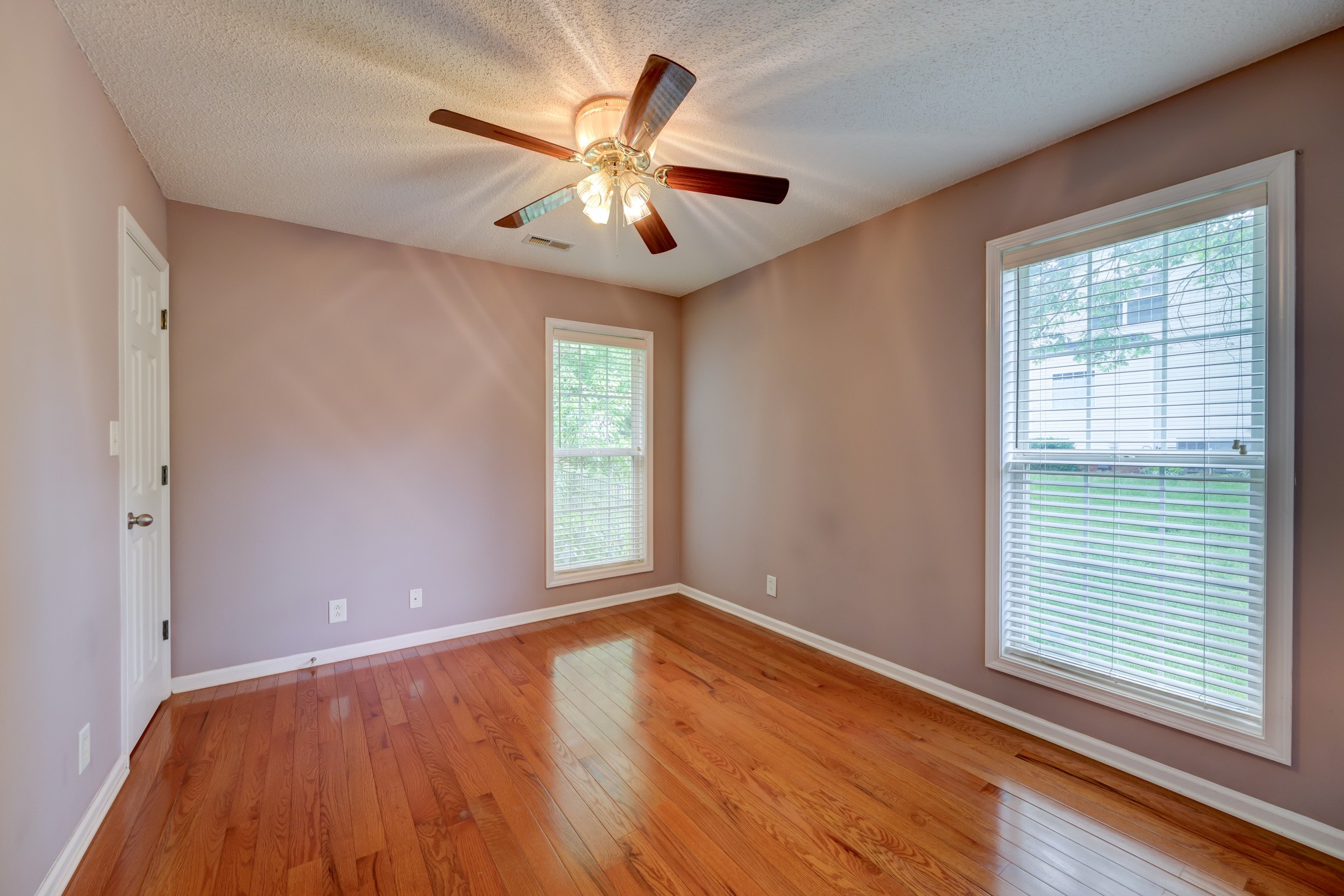 4445 Taylor Hall Lane Adams, TN 37010 - Photo 46 of 65 wooden floor in an empty room with a window