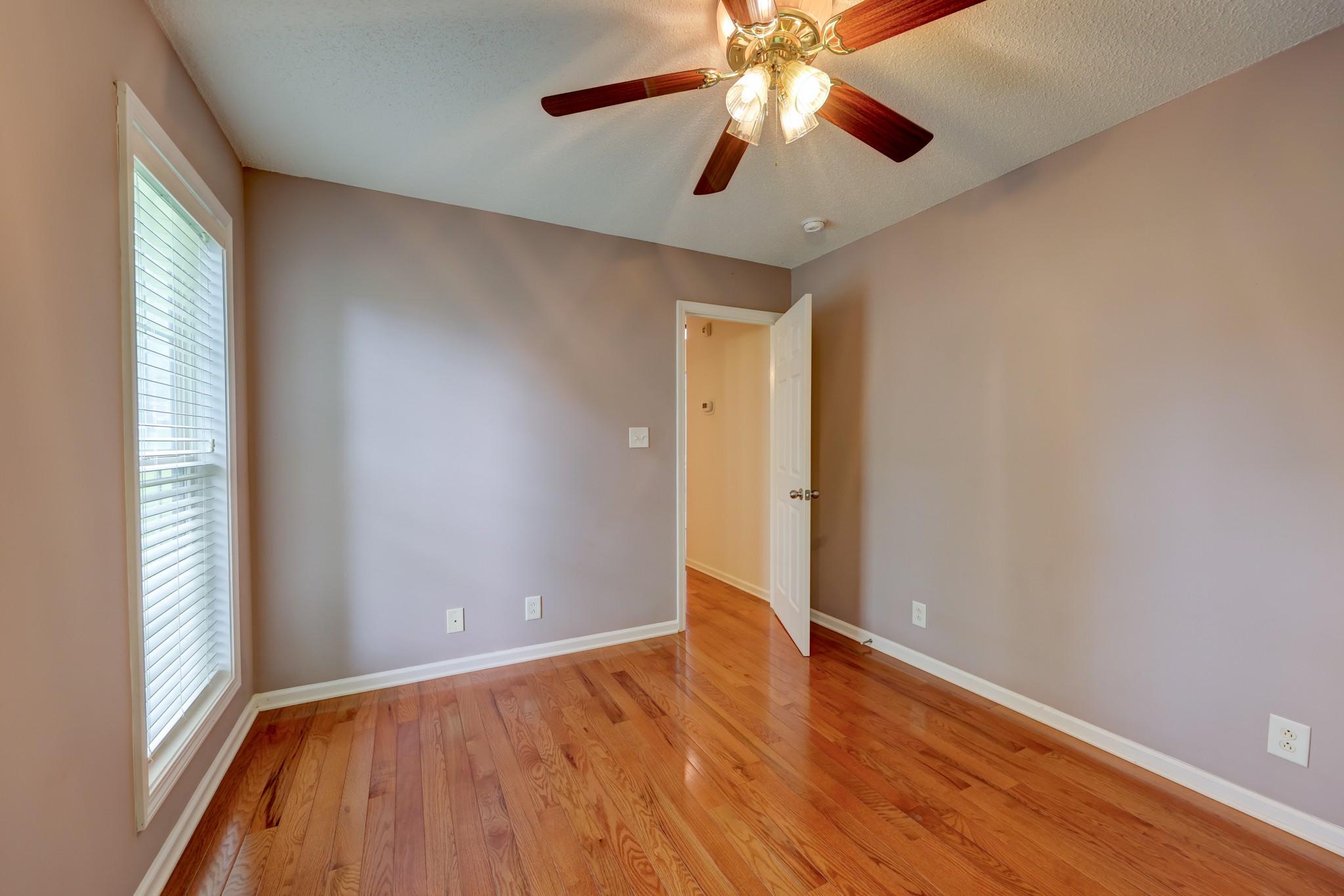 4445 Taylor Hall Lane Adams, TN 37010 - Photo 48 of 65 wooden floor in an empty room with a window