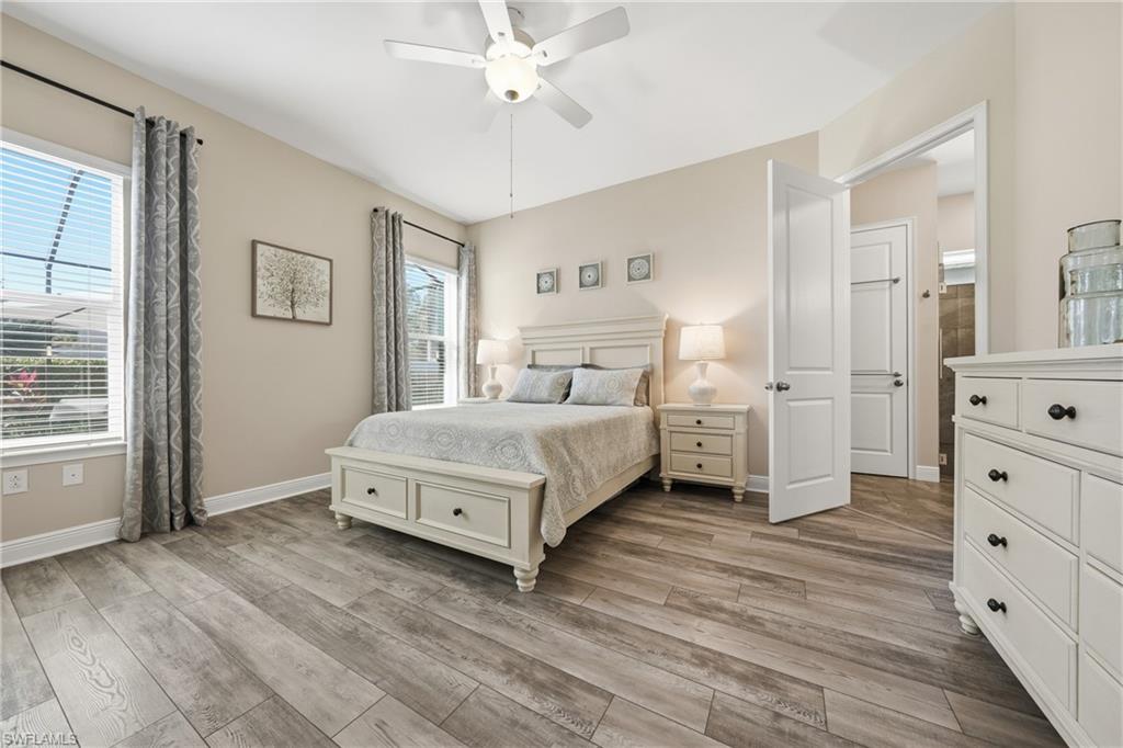 3344 Pilot Circle Naples, FL 34120 - Photo 16 of 50 a bedroom with a large bed and a window
