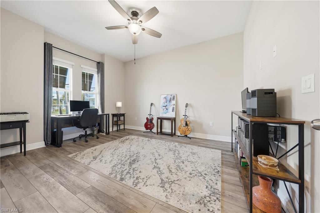 3344 Pilot Circle Naples, FL 34120 - Photo 24 of 50 a bedroom with furniture and a window