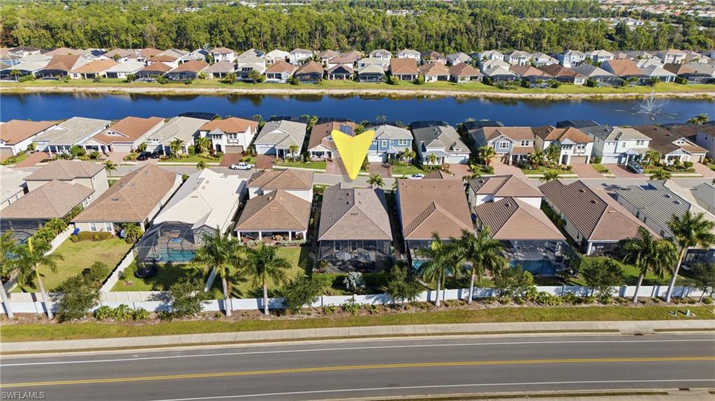 3344 Pilot Circle Naples, FL 34120 - Photo 40 of 50 an aerial view of residential houses with outdoor space